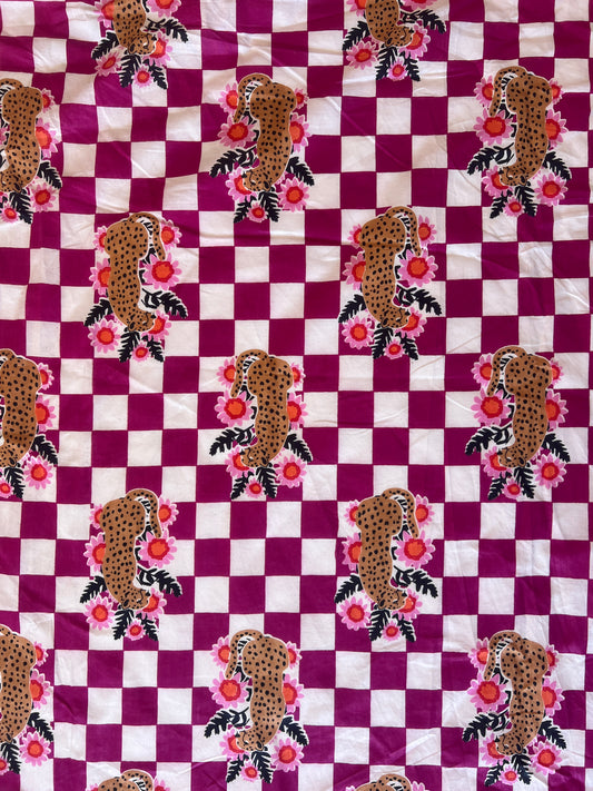 cotton fabric |  leopards with flowers on plum and white checks