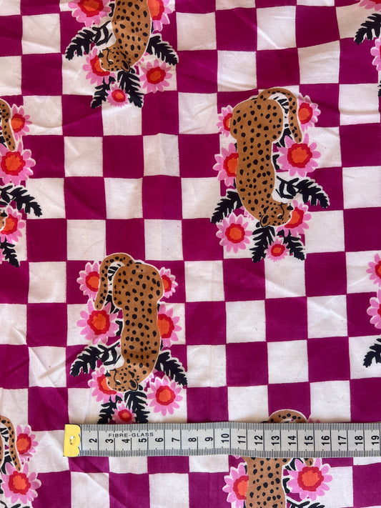 cotton fabric |  leopards with flowers on plum and white checks