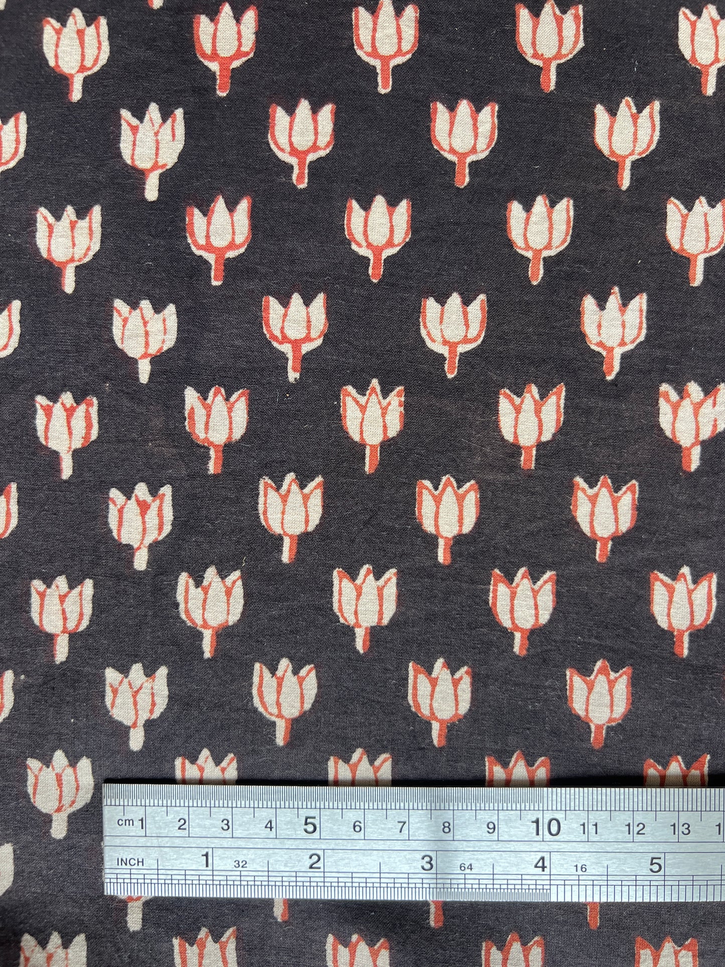 cotton fabric |  little red buds on deep chocolate brown