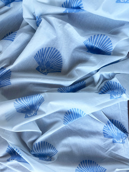 cotton fabric |  pale blue shells on white
