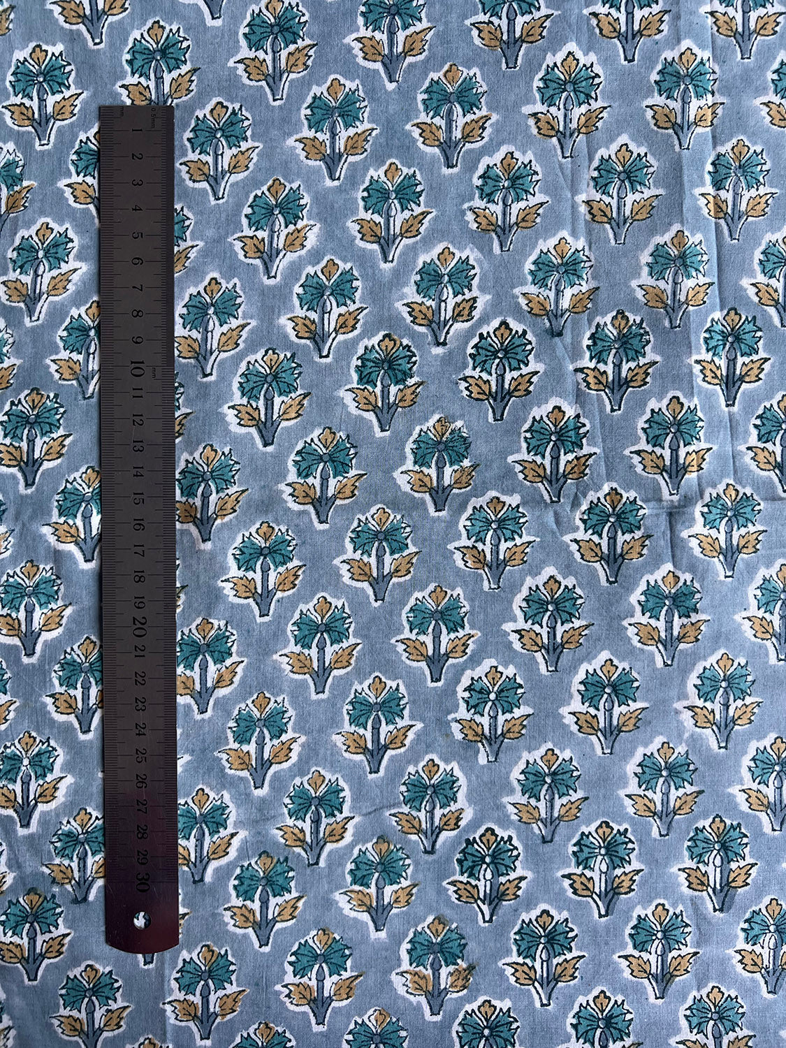 cotton fabric |  blue grey, yellow & teal buds